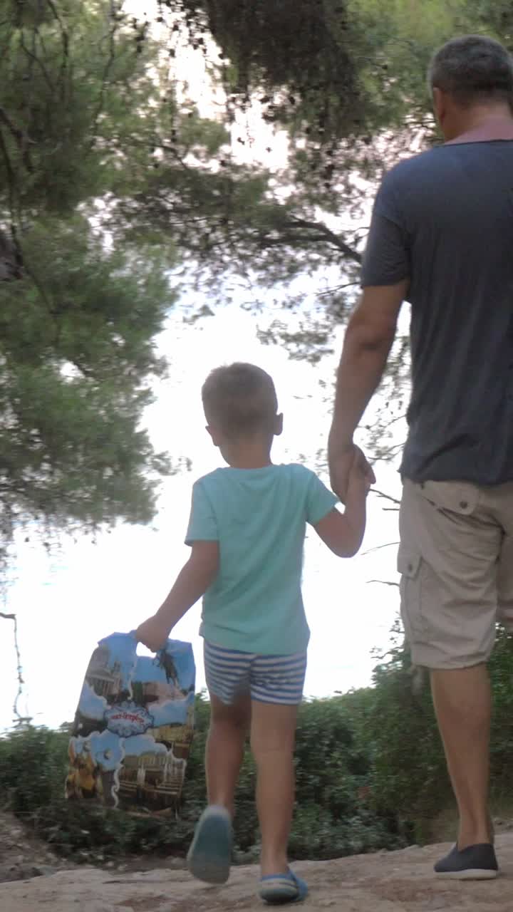 Father and Son Walking Together