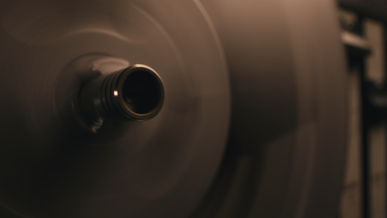 A vintage tape recorder in a pulsing light