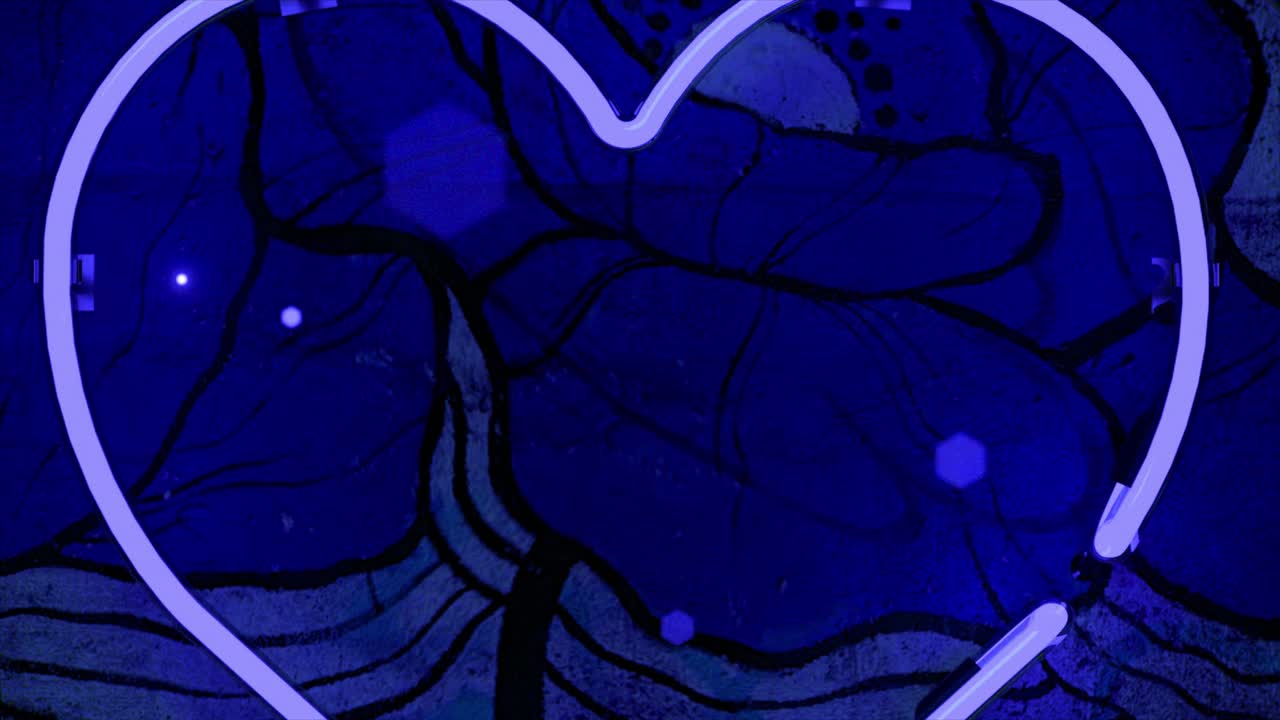 corazón de neón sobre un fondo azul