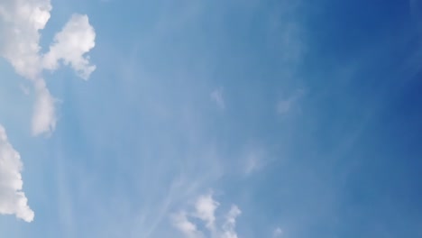 Seamless-loop-of-fluffy-clouds-in-a-blue-sky-in-a-summer-shot-on-a-clear-day