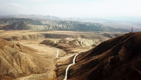 Incredible-mountain-road-passing-through-a-valley-exiting-the-mountain-pass