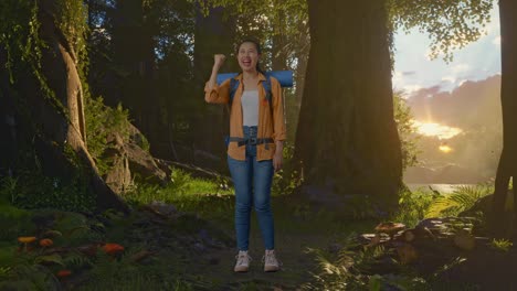 full body of asian female hiker with mountaineering backpack screaming goal celebrating the success while exploring forest nature