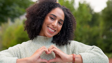 face, smile and woman with heart hands