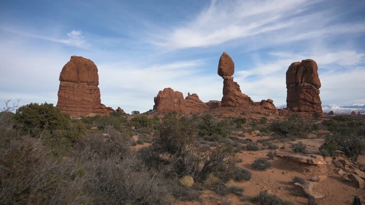 Close up view of Balance Rock on a hike in Arches National Park, pan