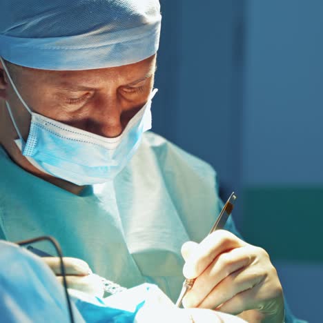 teamwork of surgeons doing plastic surgery. medical specialists performing blepharoplasty in hospital. doctors during cosmetic procedure. close-up.