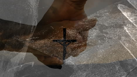 hands holding with cross symbol, creating animation on textured background