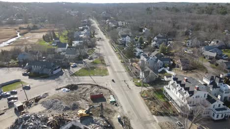 aerial footage of a demolished hotel at an intersection of roads