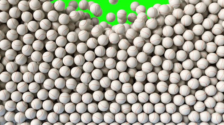 Baseball game balls falling down from above and filling the screen. Basketball balls background pattern texture on green screen.