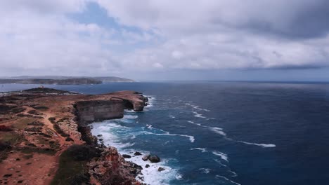 Drone-video-from-Malta,-Mellieha,-Armier-on-a-windy-and-cloudy-day