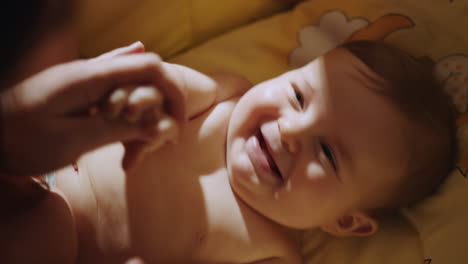 baby joyfully playing