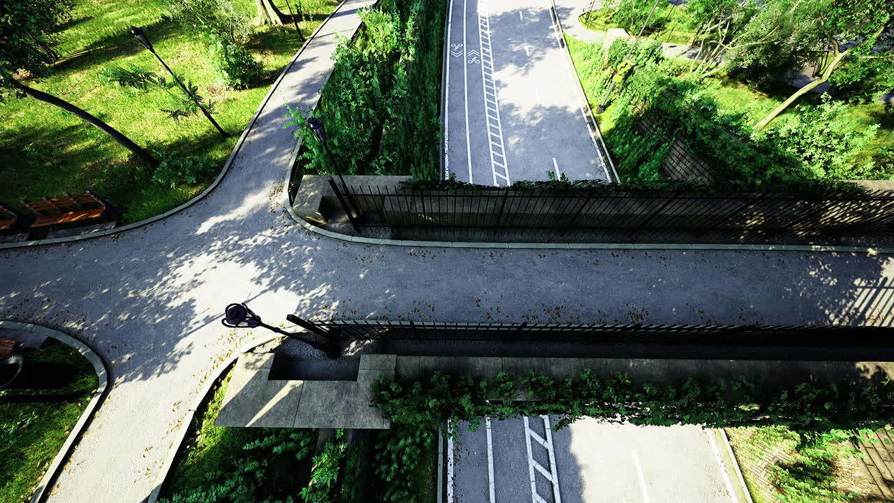 View of a park entrance with natural surroundings and winding pathways