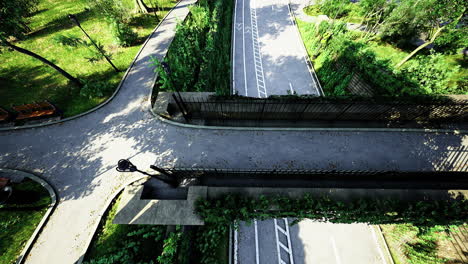 view of a park entrance with natural surroundings and winding pathways