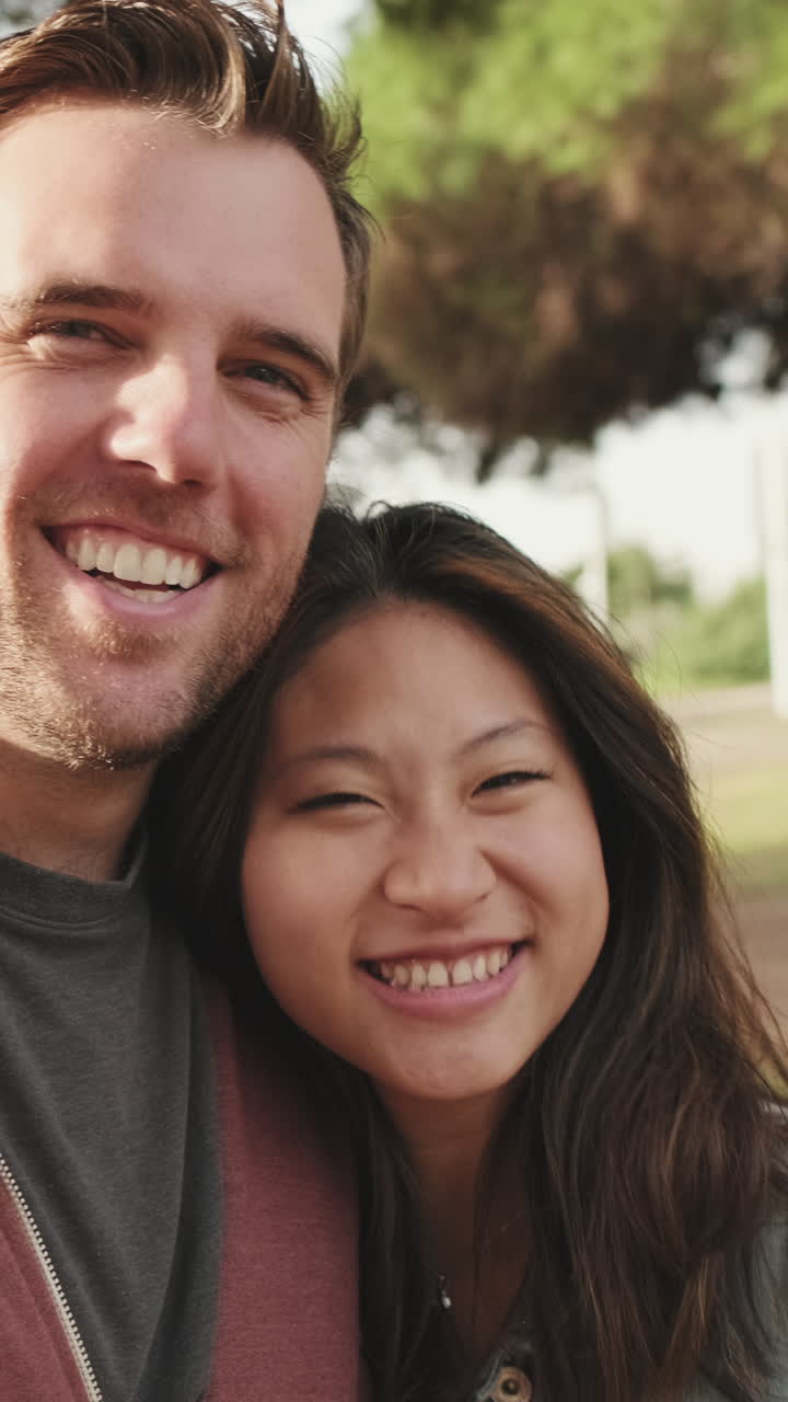 Couple Sharing a Kiss Outdoors