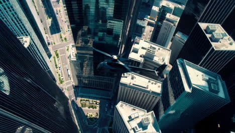 helicopter flying above skyscrapers in a city