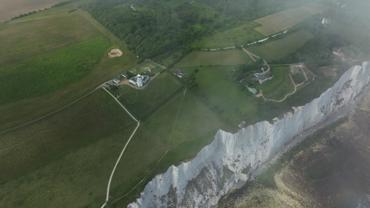 Aerial View Of South Foreland Lighthouse And White Cliffs Of Dover On A Misty Morning In Kent, England, UK