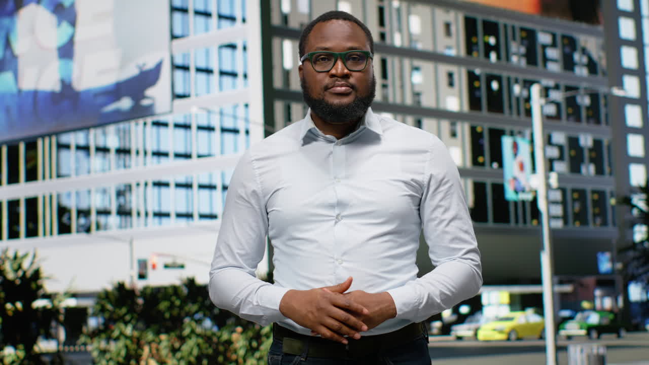 Modern adult male walking along the sidewalk with confident attitude
