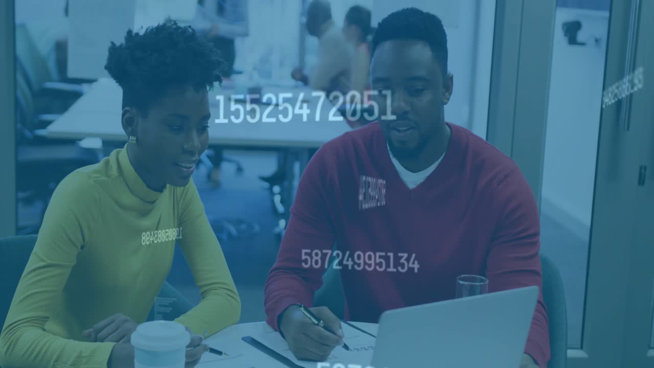 Woman and man working at laptop in meeting, analyzing data and initiating animated numeric overlay