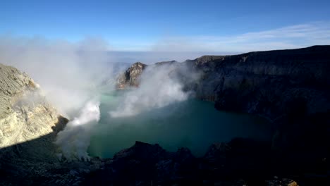 4k video : blue sulfur flames at volcano, kawah ijen volcano, east java, indonesia.