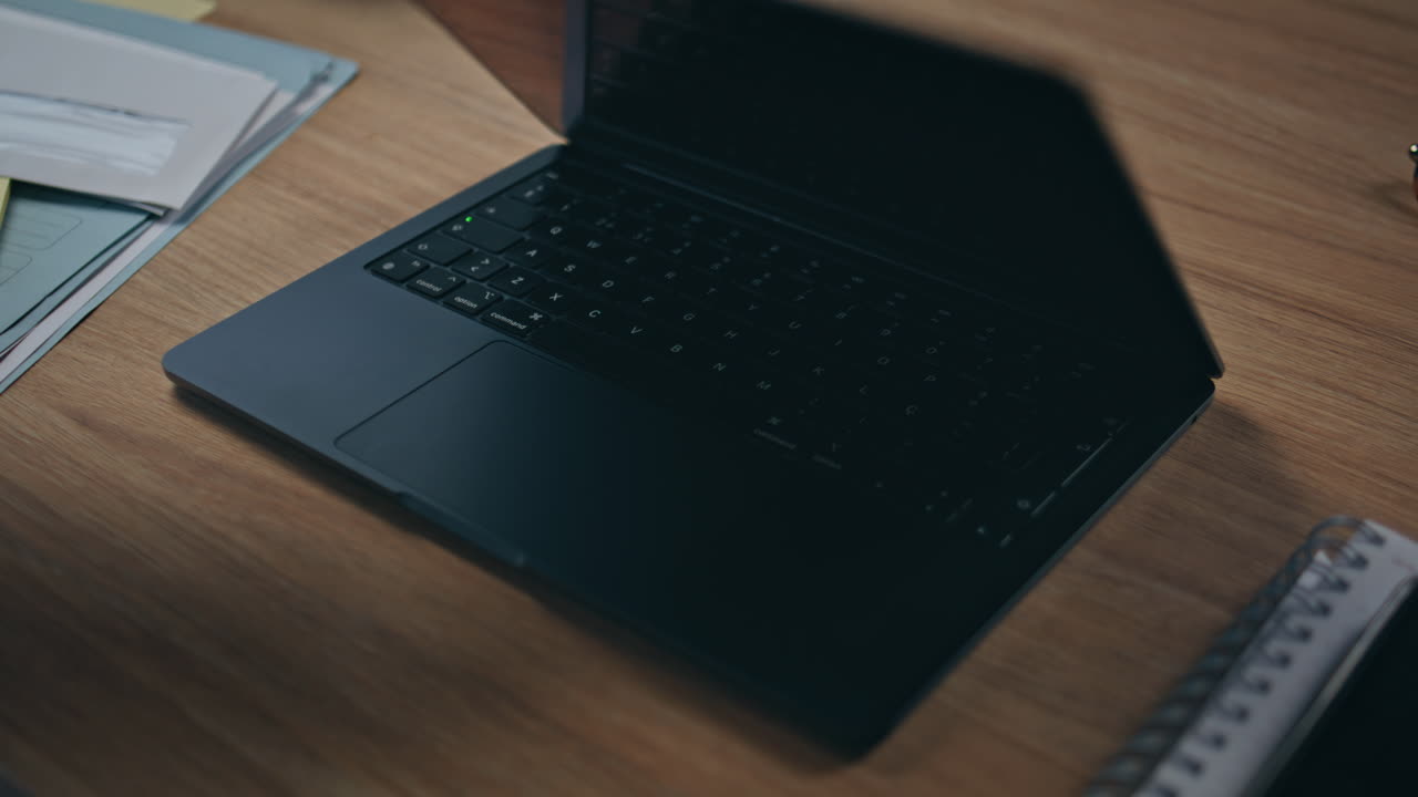 Lady hands opening laptop lid at workplace closeup. Journalist typing keyboard