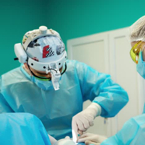 cosmetic surgeons during operation