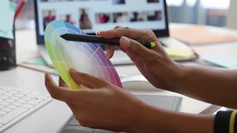 young woman working in a creative office