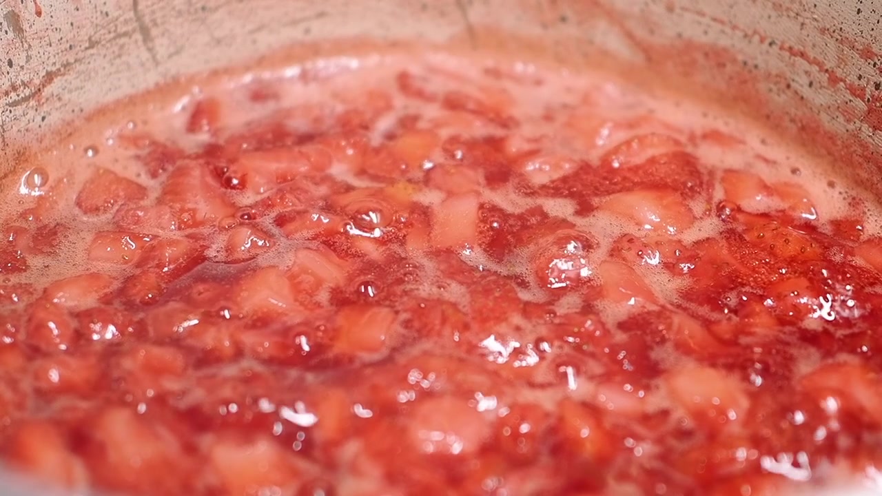 Fresh Strawberries Simmering in a Pot to Make Jam
