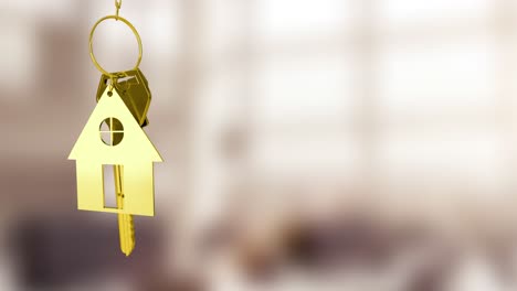 Animation-of-hanging-golden-house-keys-against-blurred-background-with-copy-space