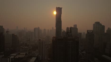 view of bangkok city with sunset in the background_drone view