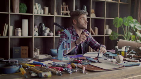 Unhappy-man-tired-of-work-and-throwing-pencil-on-table.-business-owner-in-stress