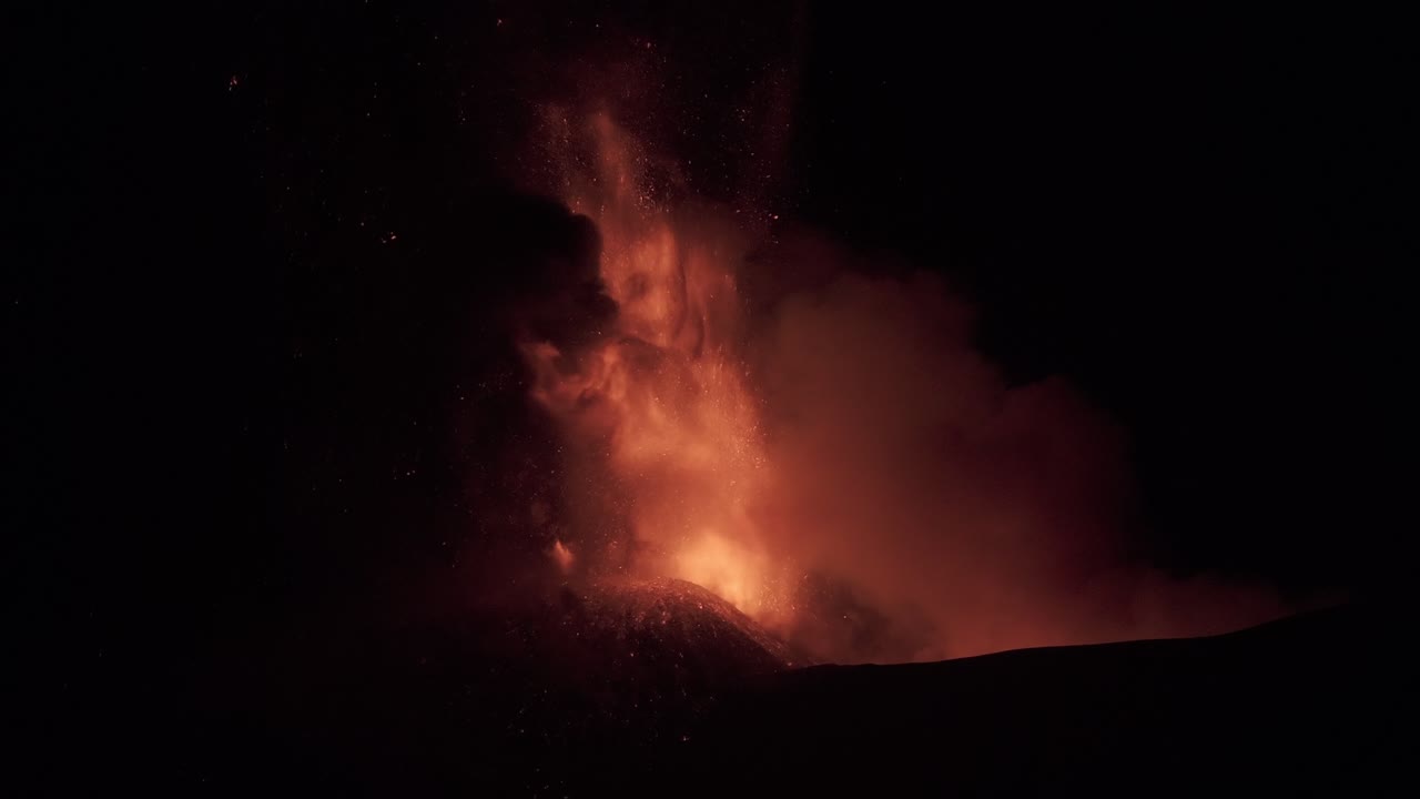 Active Volcano Eruption at Night. Red Lava, Vapor and Ash From Mount Etna, Sicily, Italy