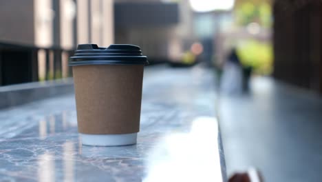 coffee cup on a marble countertop outdoors