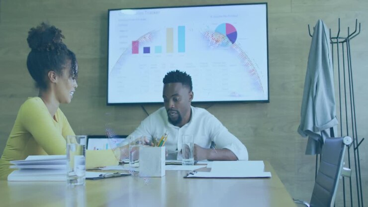 Animation of globe over diverse business people at office