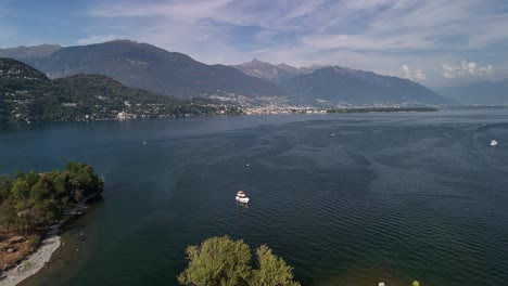 backward shot of lake maggiore or verbano is the second largest lake in italy located on the southern side of the alps on the island of brissago.