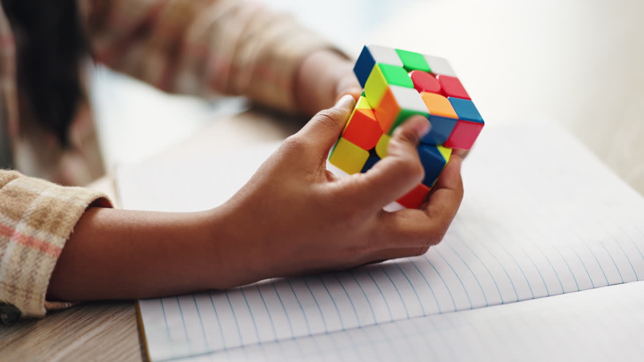 Girl solving Rubik's Cube
