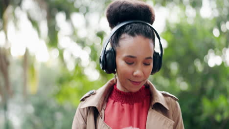 headphones, phone or woman in park dancing