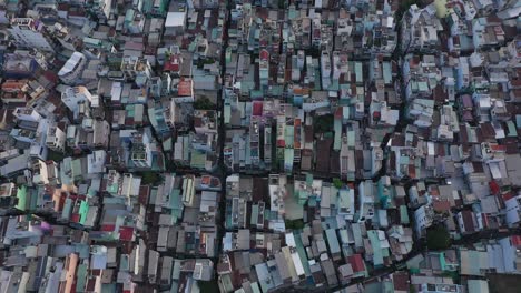 top down of high density urban rooftops in district four port area along the saigon river in ho chi minh city, vietnam