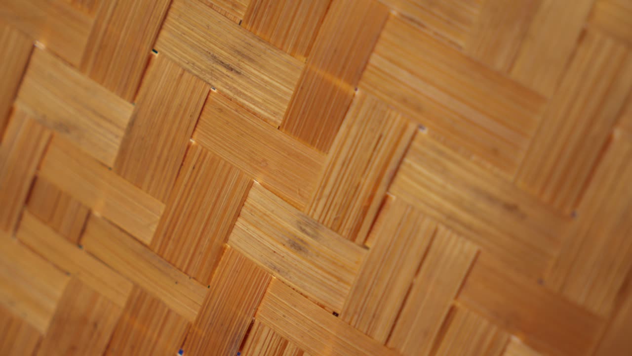 Intricate texture of intersecting bamboo stalks, showcasing their natural cross-pattern