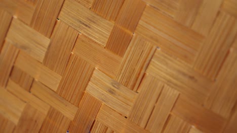 intricate texture of intersecting bamboo stalks, showcasing their natural cross-pattern