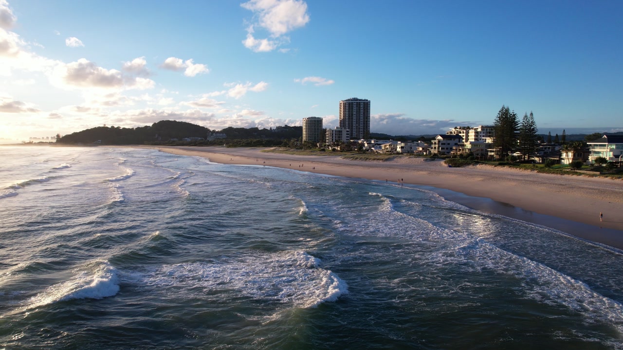 Beach During Sunrise At Palm Beach In Gold Coast, QLD, Australia. - aerial shot