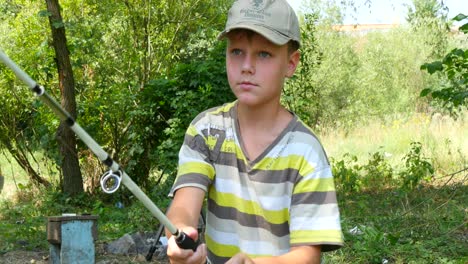 boy fishing in the forest