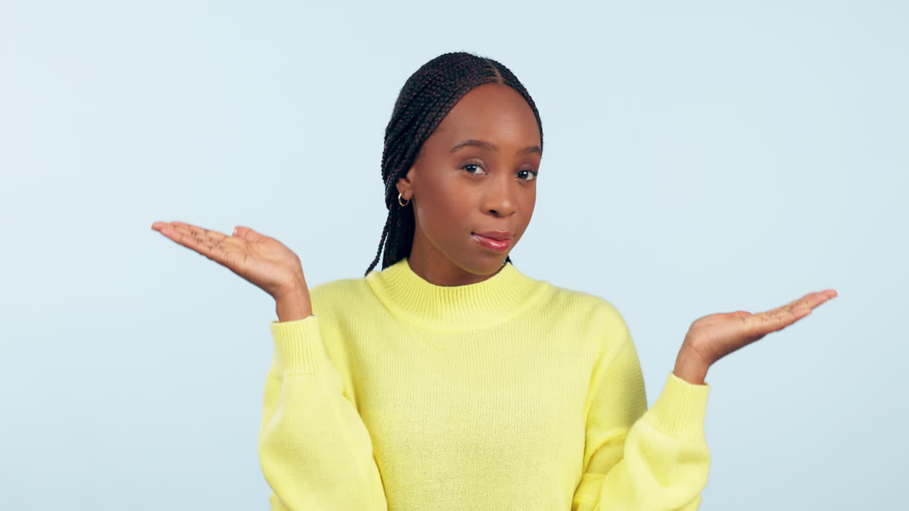 Black woman, thumbs up and down in decision