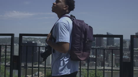 african american male tourist walking and enjoying city views stabilized shot in 4k uhd