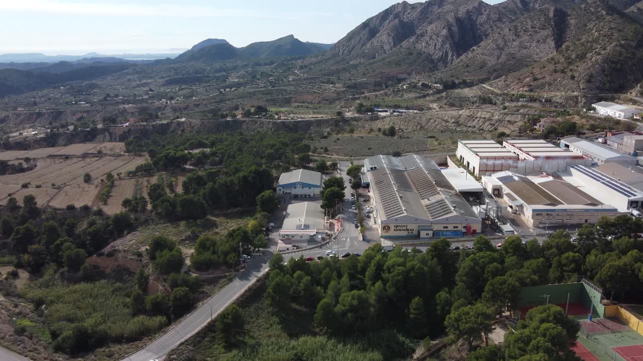 Aerial View of Industrial Area in Mountainous Landscape