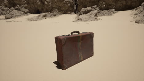 vintage suitcase abandoned in the desert