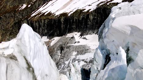 aerial take of argentière glacier in the french alps, nearby chamonix