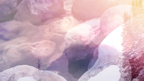 animation of stones covered with snow over winter scenery