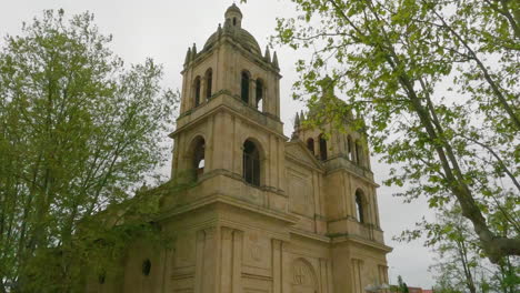 European-Church-Building-Cathedral-in-Salamanca,-Spain---Low-Angle-Tilt-Up