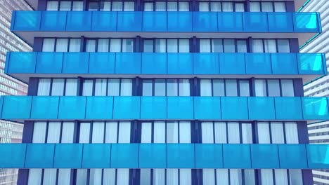 facade of a modern mirrored office building was removed from a drone. close-up