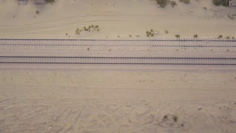 Train-tracks-in-the-desert-aerial-footage