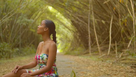 360 pan of a sexy girl sitting in a bamboo cathedral on the caribbean island of trinidad